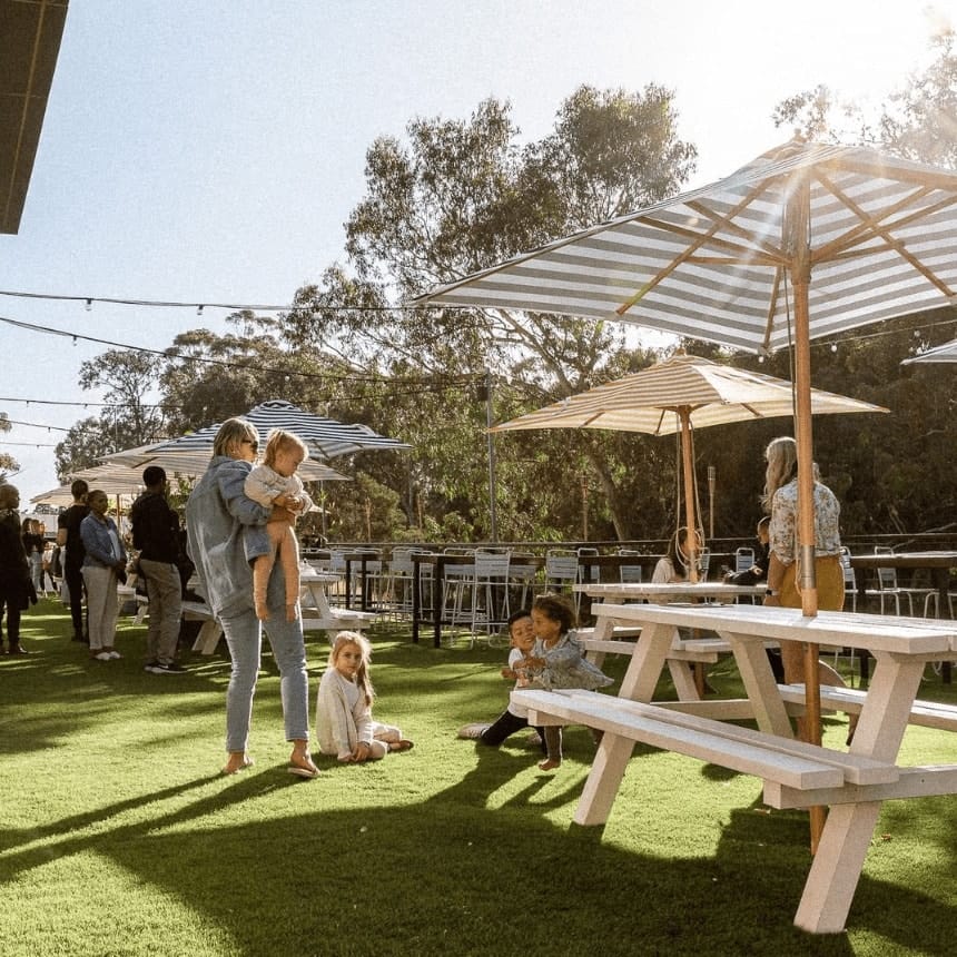 A family with kids dine in this pet friendly restaurant in Melbourne