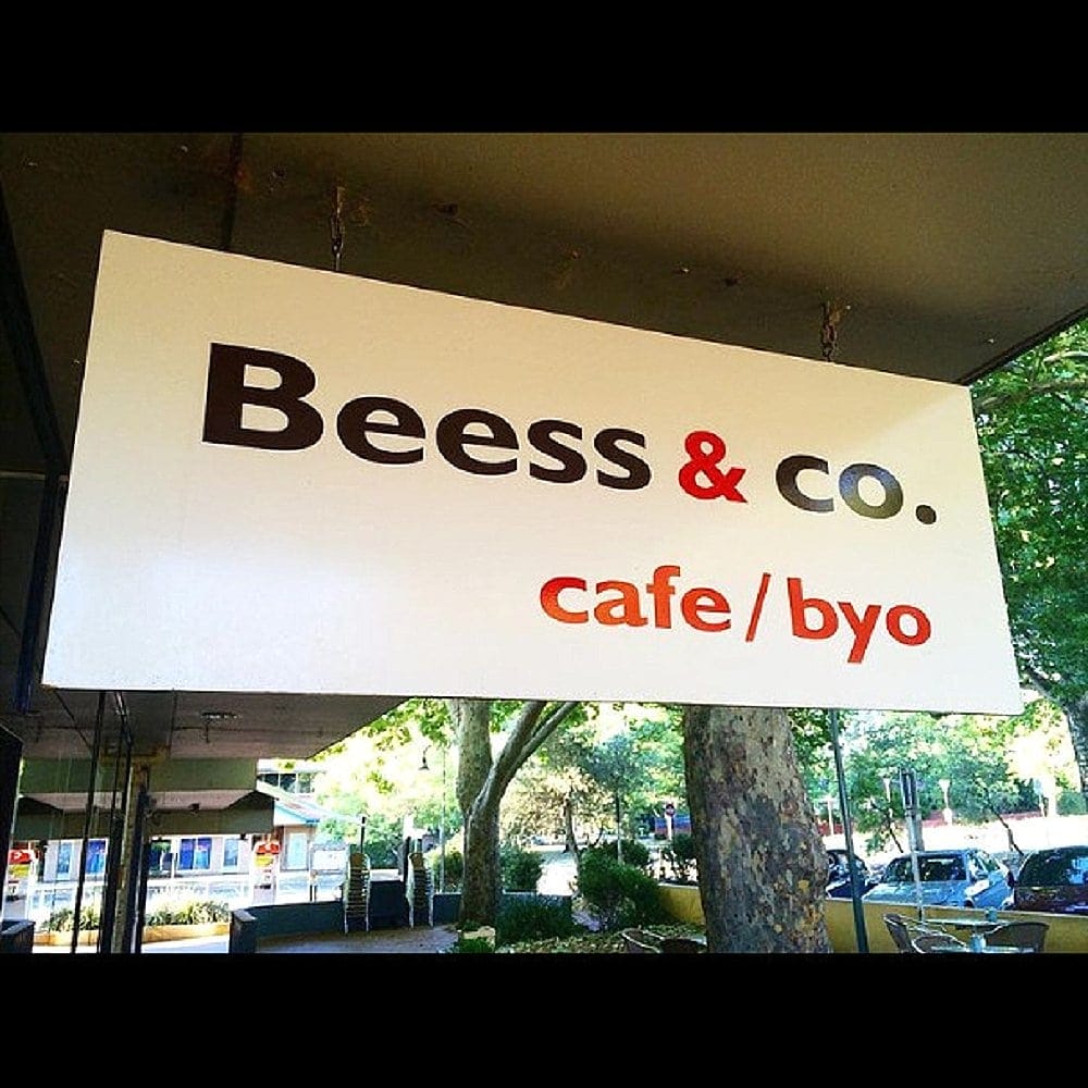 A dog friendly cafe's logo is displayed proudly in this photo. The cafe is called Beess & Co in Canberra