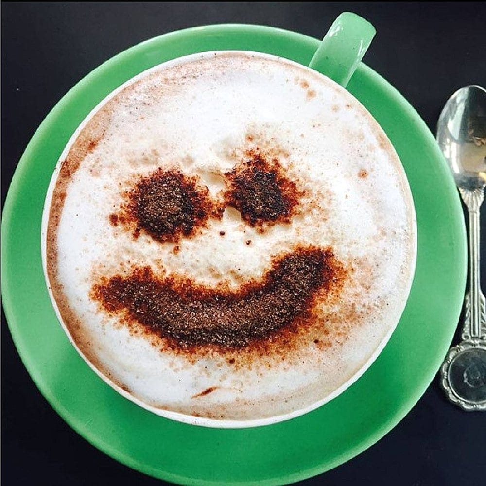 A smiley face coffee art served from this place called Remedy on Kingston Foreshore Cafe