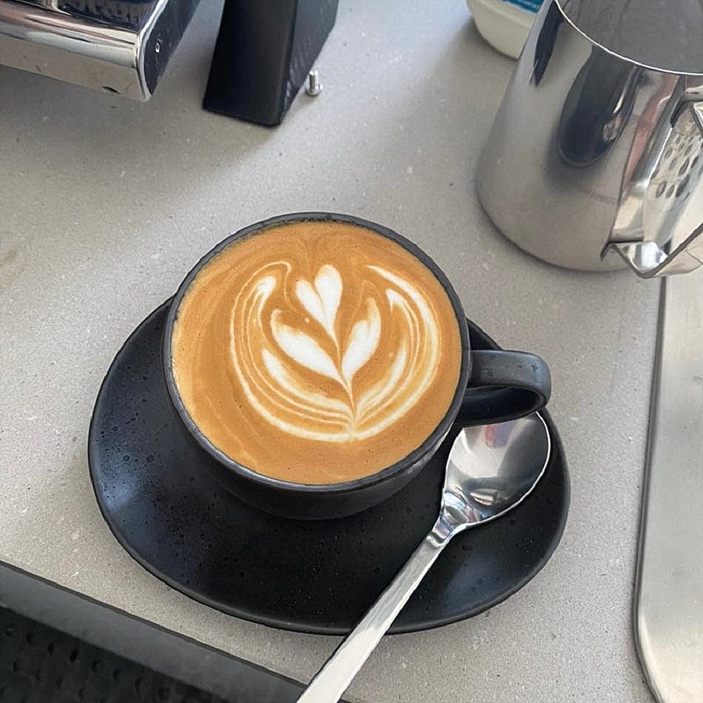 Puddlecafe in Canberra showing off their beautiful latte art on display