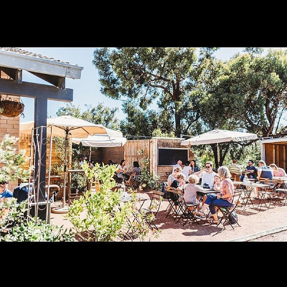 Large outdoor dining area showcased of this dog friendly cafe in Canberra called Two Before Ten