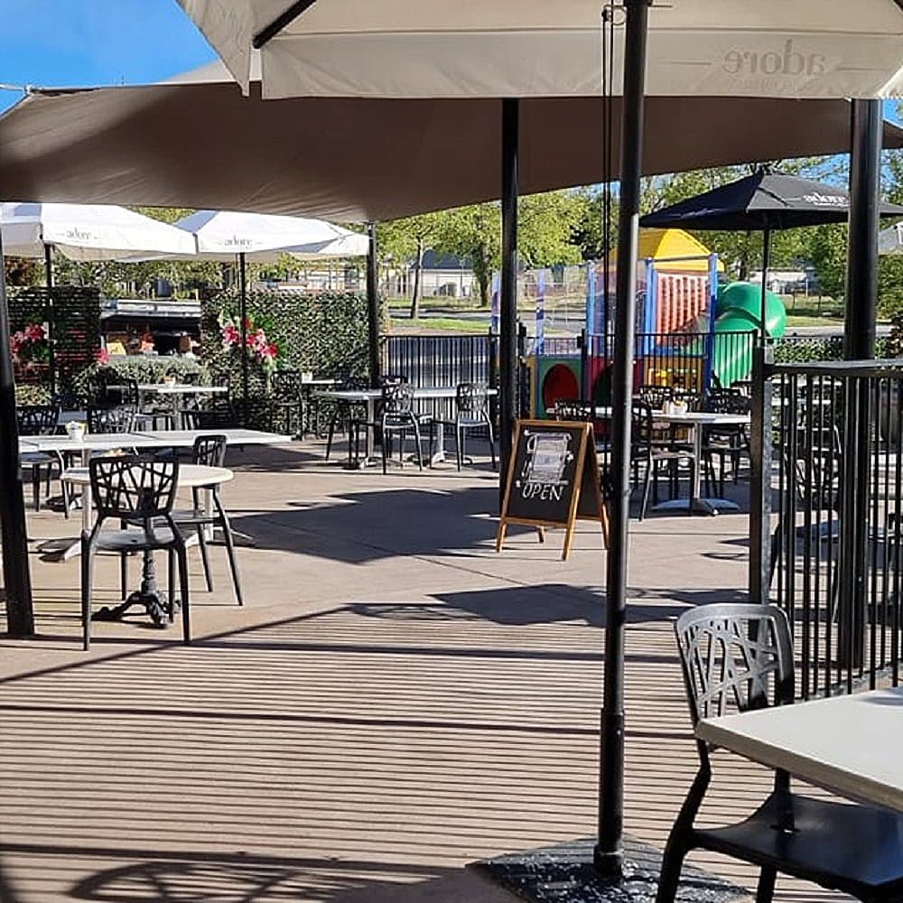 Outdoor dining space of Cafe Injoy in Canberra that's perfect for dogs to stay in