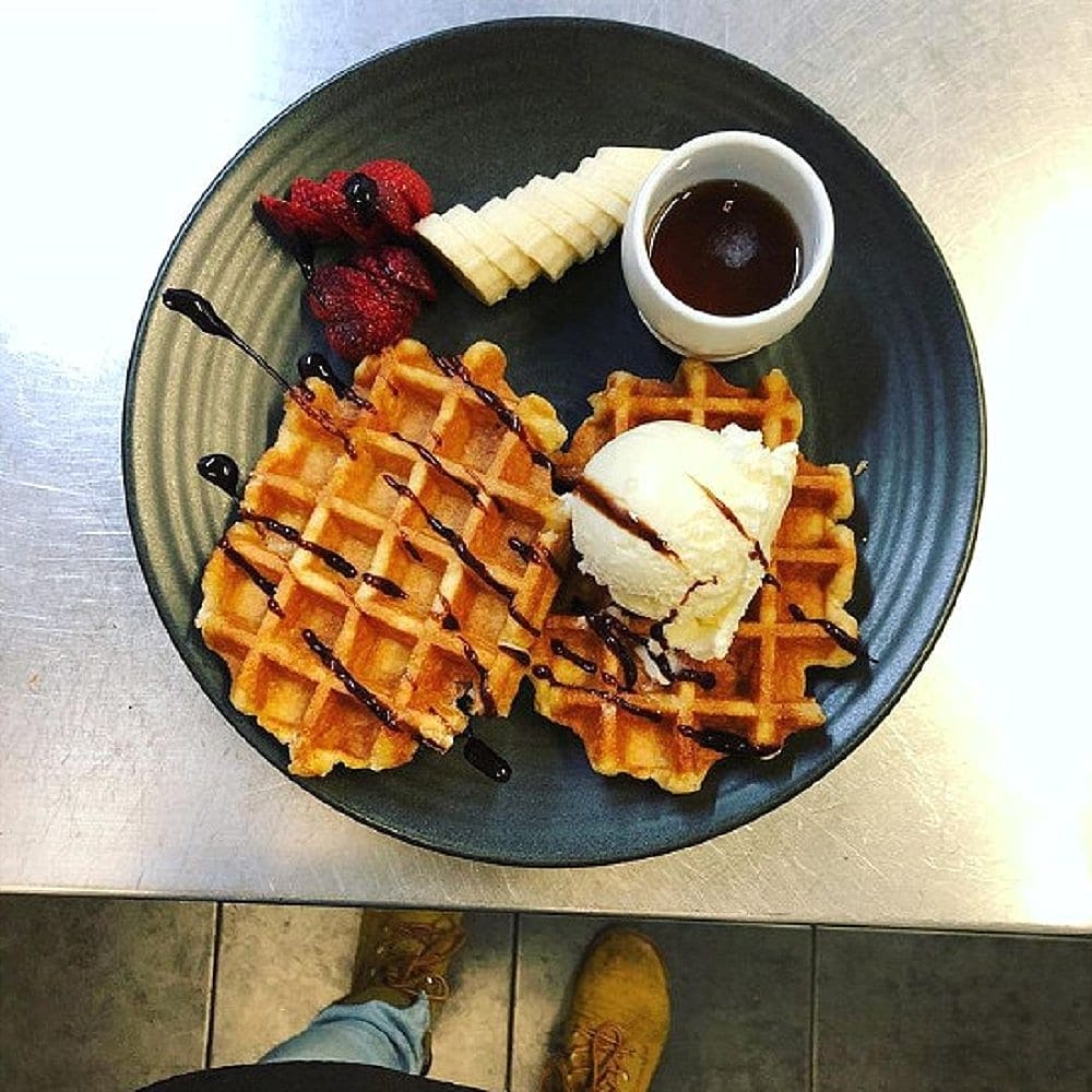 Waffles and chocolate served at a dog friendly place in Canberra